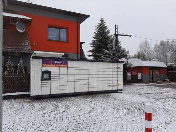 Paczkomat STA14M parking przy Delikatesach